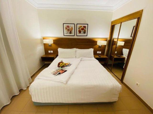 Hurghada Suites & Apartments Serviced By Marriott Екстер'єр фото A bedroom at the hotel