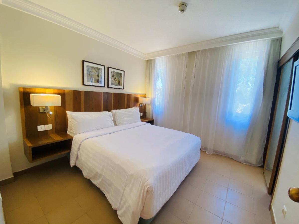 Hurghada Suites & Apartments Serviced By Marriott Екстер'єр фото A bedroom at the hotel